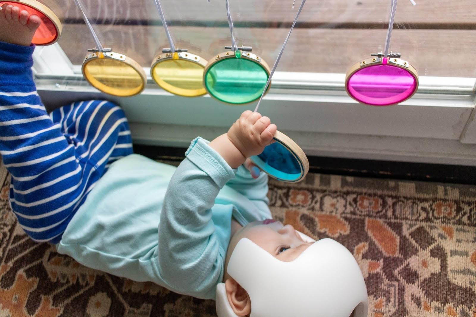 Baby development happens best through sensory rich play and exploration. Here's an easy, baby activity to help your baby explore color.