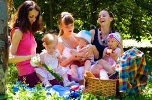Mothers and babies at a picnic