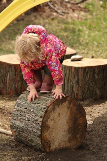 balancing on a play log