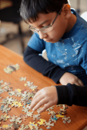 As a pediatric OT, I'm always surprised at how many parents of kids with Autism (ASD) haven't been told about the big link to sensory processing. Read on to learn about this important connection...