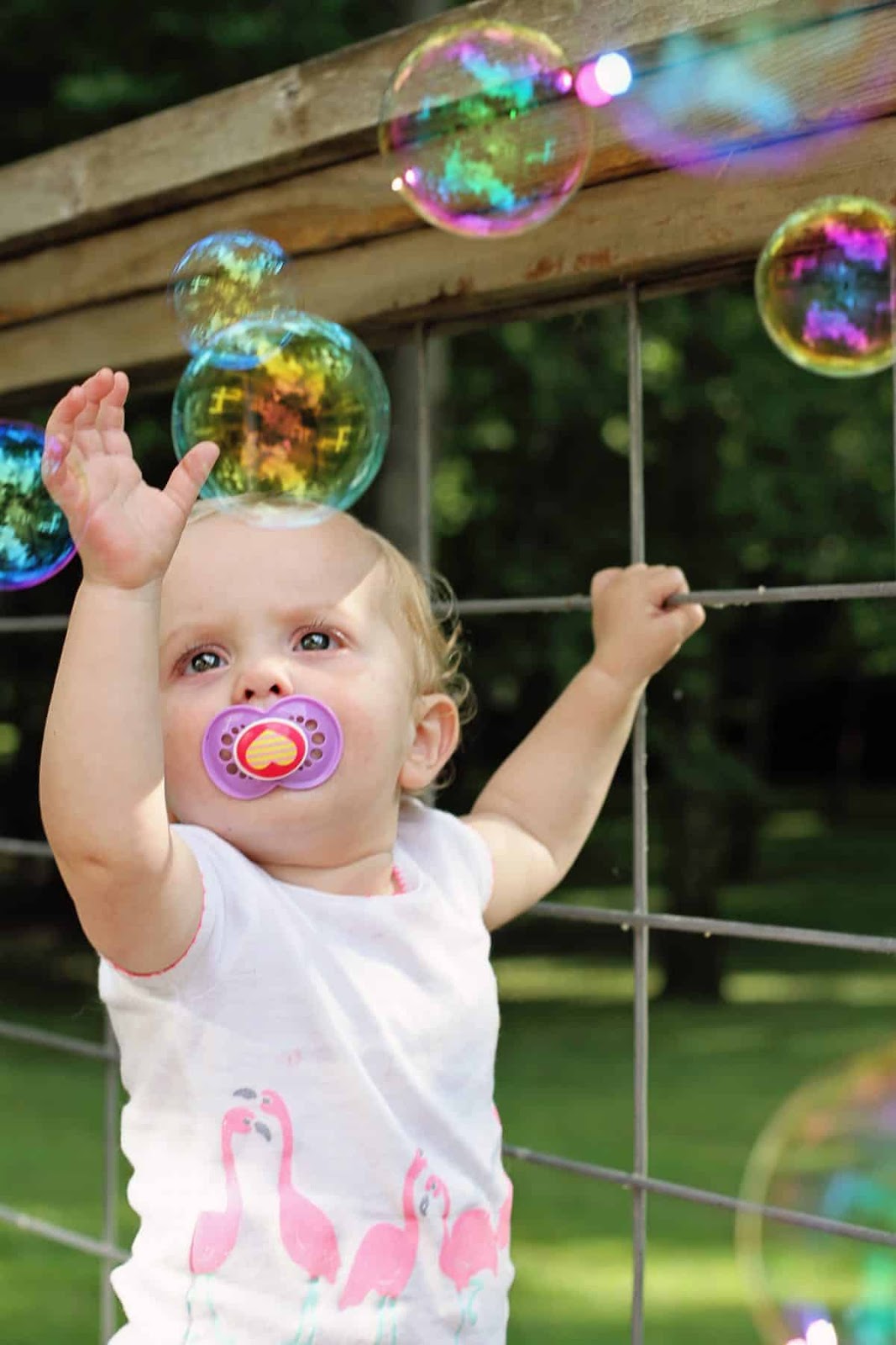 easy outdoor activities for babies - playing with bubbles