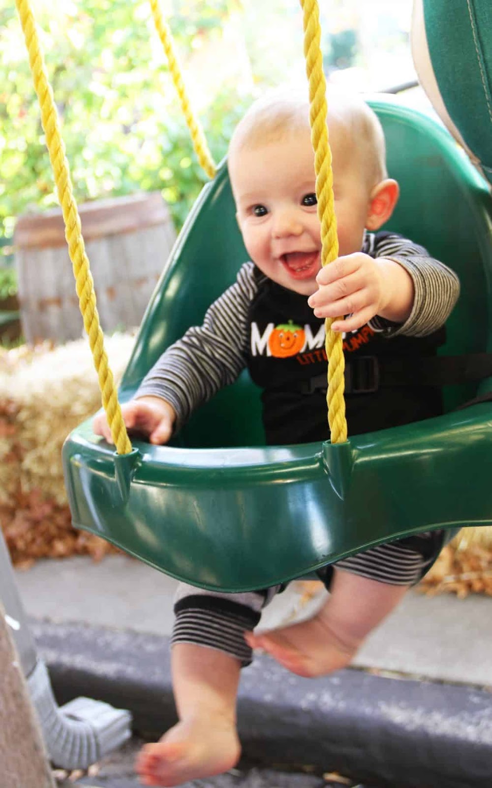 playing on the swings - outdoor activity for baby