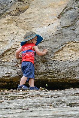 Trail Baby navigating along Rock Formation, Photo by Emily, on Instagram @hiking.home