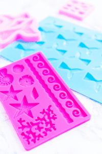 under the sea and ocean themed ice cube molds to make shaped cubes for playing with ice