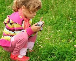 A picture containing grass, outdoor, little, child

Description automatically generated