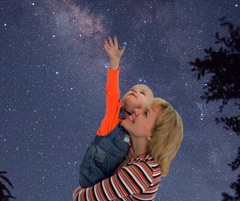 Mom and baby looking at stars